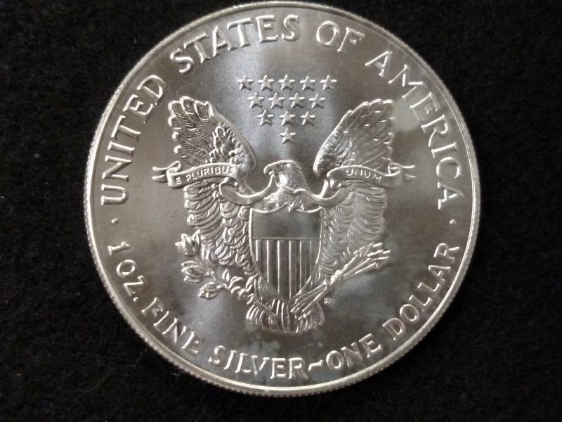lot 56 image: 1993 Silver Eagle Dollar, 1 Ounce ....