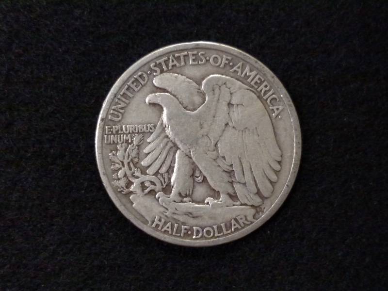 lot 64 image: 1935 Walking Liberty Silver Half Do...