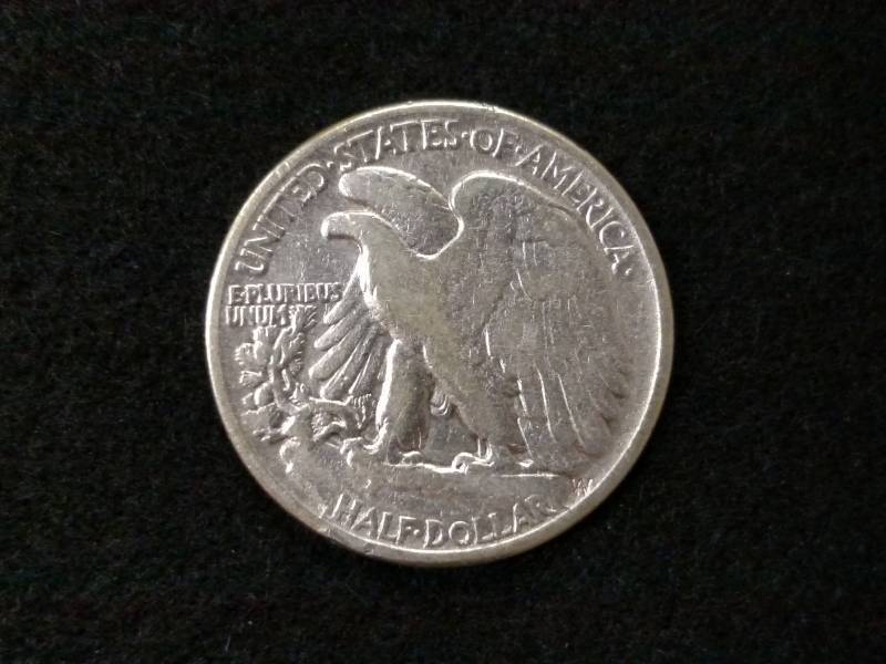 lot 75 image: 1945 Walking Liberty Silver Half Do...