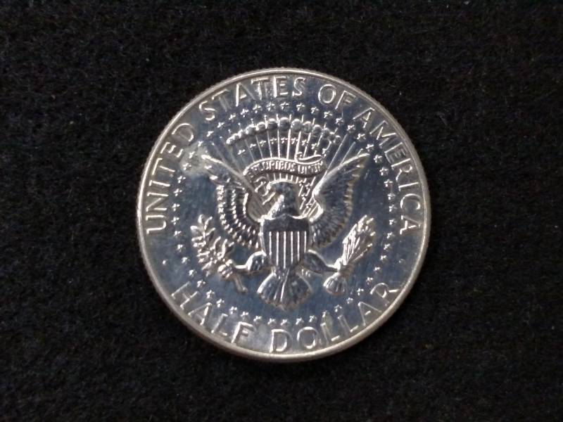 lot 90 image: 1964 BU Franklin Silver Half Dollar...