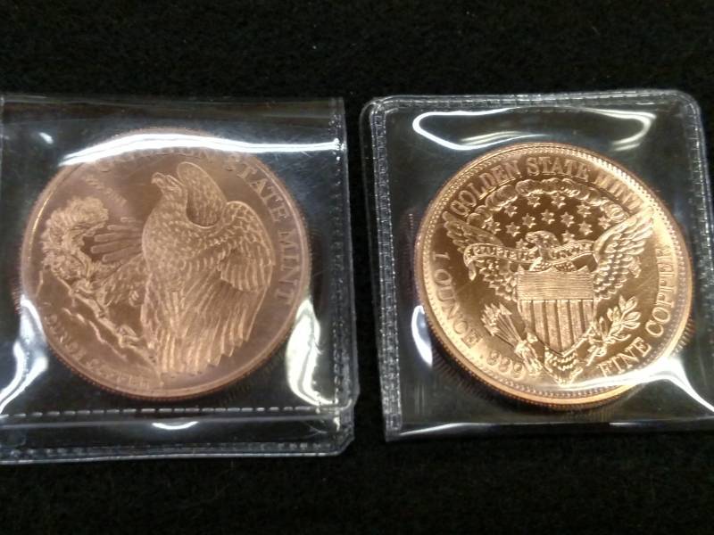 lot 101 image: (2) One Ounce .999 Copper Coins...