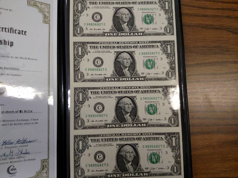 lot 125 image: Book of (4) Uncut 2009 One Dollar F...