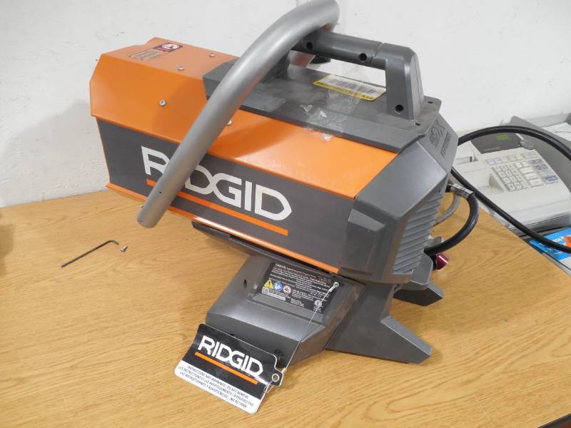 lot 6 image: RIDGID 18-Volt 60K BTU Hybrid Forced Air Propane Portable Heater