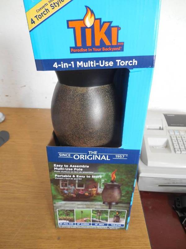lot 59 image: TIKI Brand 64-Inch 4-in-1 Resin Jar Torch, Stone