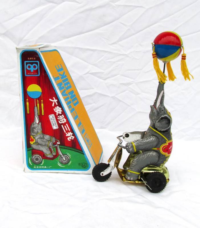 Large Lot of New Vintage Elephant on Bike Wind Up Tin Toys