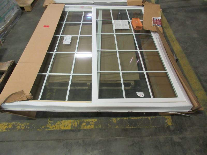 lot 83 image: ReliaBilt Grilles Between The Glass White Vinyl Sliding Patio Door With Insulating Core (Common 72-in X 80-in Actual 70.75-in x 79.5-in) - Frame and nailing fin(s)Damaged See Photos)