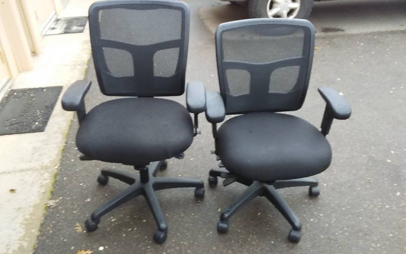 lot 12 image: 2-Rolling Adjustable  Office Chairs With Arms. Black With Black Mesh Back.