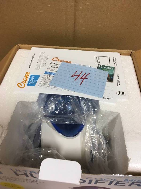 lot 44 image: Crane 1 Gal. Cool Mist Humidifier, Penguin in good condition