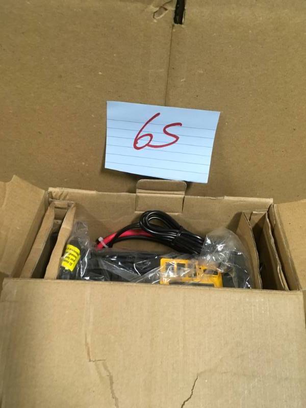lot 65 image: DEWALT 1000-Watt Power Inverter  in good working condition