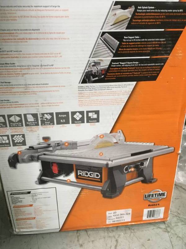 lot 70 image: RIDGID 6.5 Amp Corded 7 in. Table Top Wet Tile Saw  in good working condition