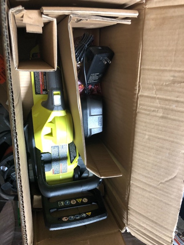lot 107 image: RYOBI ONE 12 in. 18-Volt Brushless Lithium-Ion Electric Cordless Chainsaw - 4.0 Ah Battery and Charger Included in good conditions