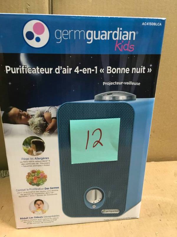 lot 12 image: GermGuardian 4-in-1 Night-Night HEPA Air Purifier System with Projector and 11 in. Table Top Tower  in good condition