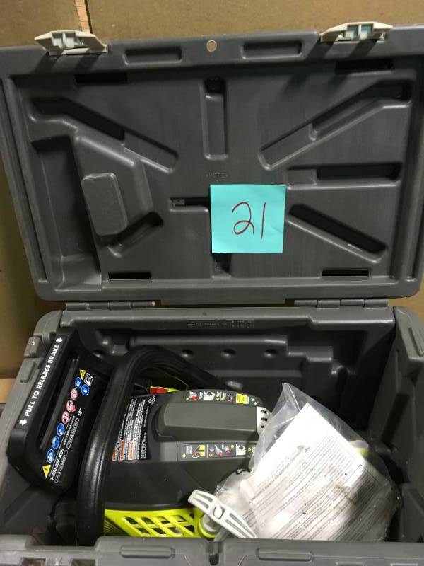 lot 21 image: RYOBI 18 in. 38cc 2-Cycle Gas Chainsaw with Heavy Duty Case  in good condition