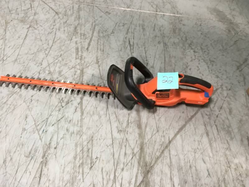 lot 22 image: BLACKDECKER 22 in. 20-Volt MAX Lithium-Ion Cordless Hedge Trimmer with 1.5Ah Battery and Charger Included  in good condition