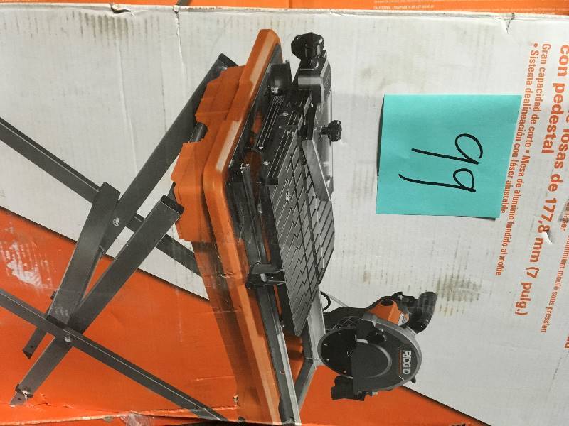 lot 99 image: RIDGID 7 in. Tile Saw with Stand   in good condition