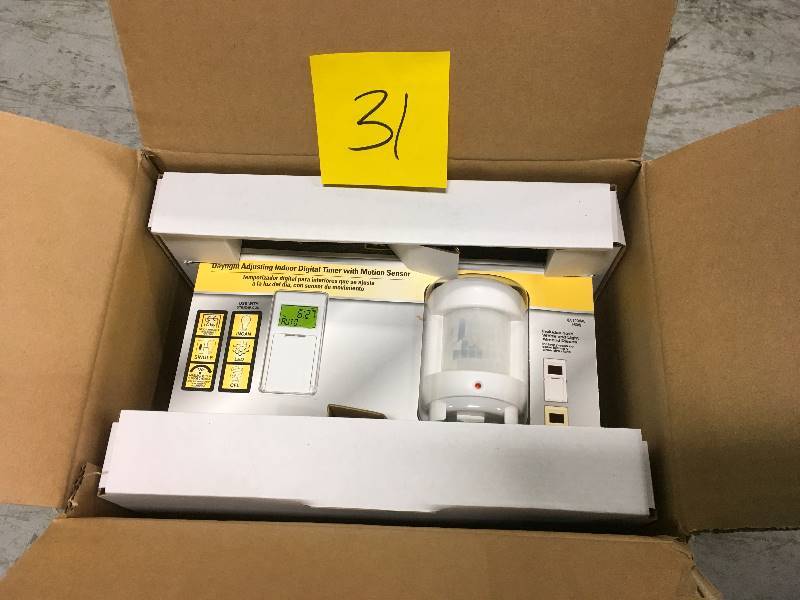 lot 31 image: Defiant SunSmart 8-Amp In-Wall Indoor Digital Timer wMotion Sensor #1000015589 3 PACK not used
