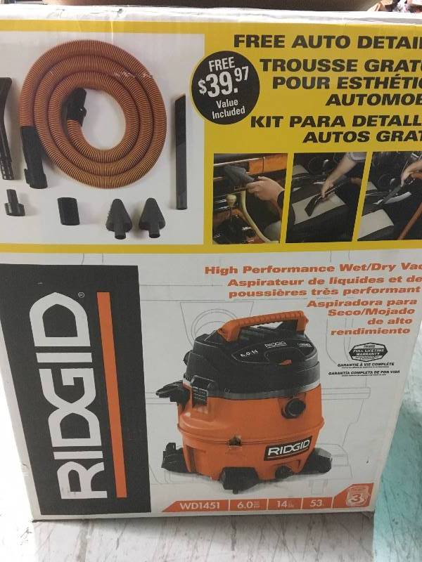lot 51 image: RIDGID 14 Gal. 6.0-Peak HP Wet Dry Vac with Auto Detail Kit in good condition