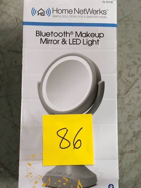 lot 86 image: Home Netwerks 6.25 in. x 12.5 in. Bi-view Bluetooth LED Handheld Makeup Mirror in Grayin good condition