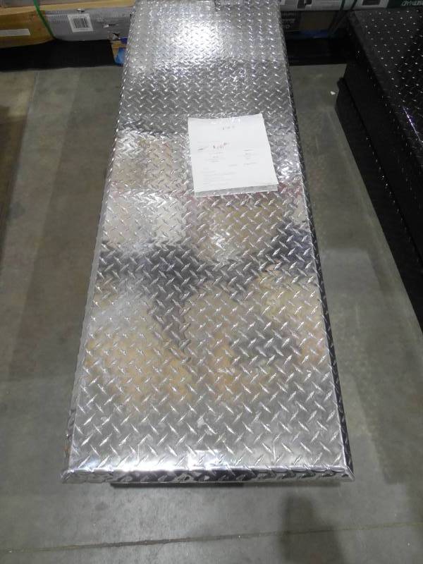 lot 28 image: Lund 9300T 63-Inch Aluminum Mid-Size Cross Bed Truck Tool Box with Full Lid, Diamond Plated, Silver
