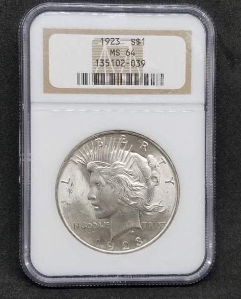 lot 1 image: 1923 S Silver Peace Dollar MS 64 Graded Coin 90% Silver