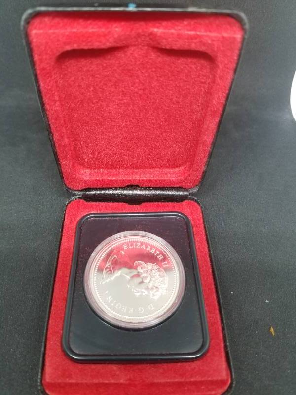 lot 68 image: 1975 Calgary Canadian Silver Dollar 50% Silver