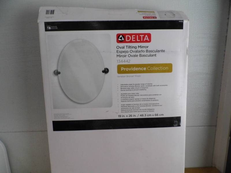 lot 24 image: Store Return Delta Mirror