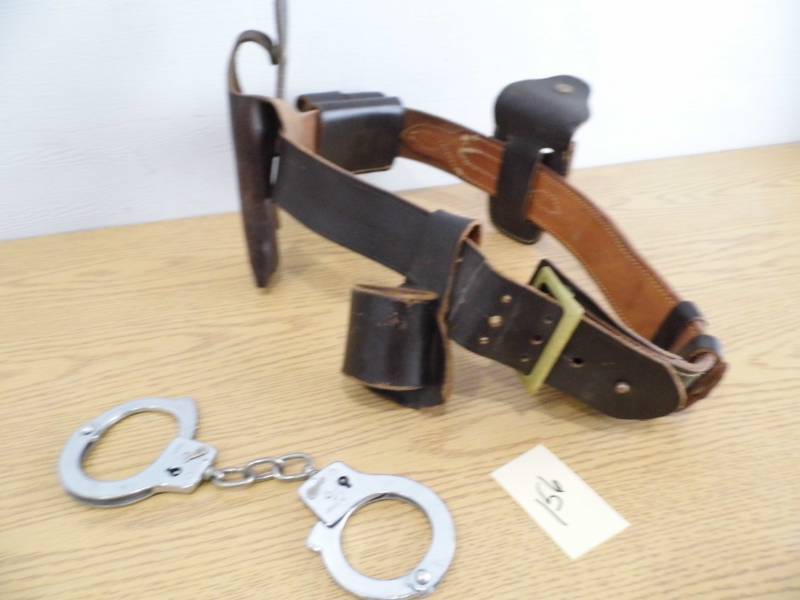 lot 156 image: Leather Holster - Hand Cuffs