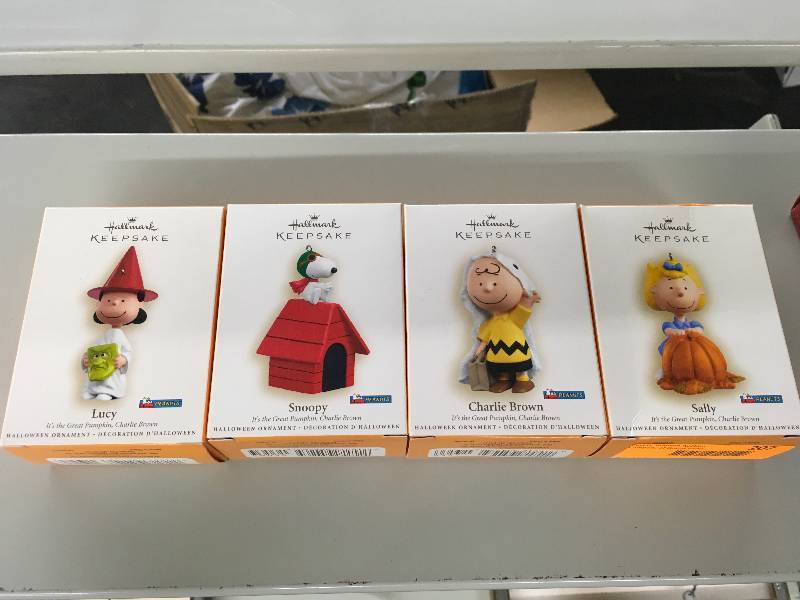 lot 207 image: Four Peanuts Ornaments