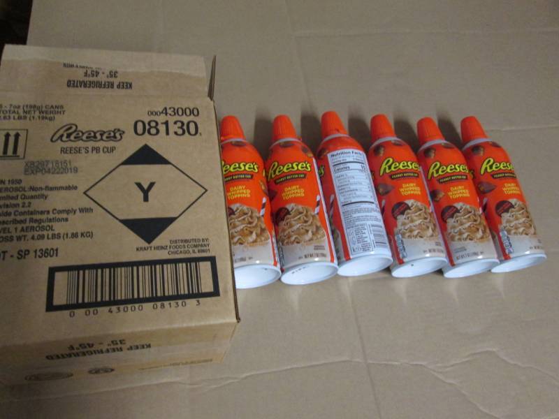 6 Cans of Reeses peanut butter cup...