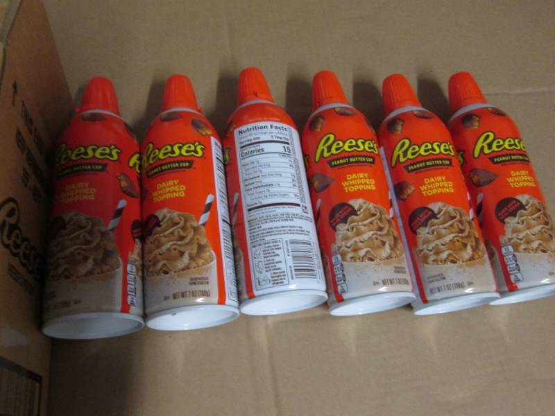 6 Cans of Reeses peanut butter cup...