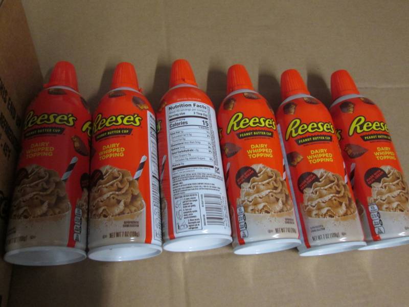6 Cans of Reeses peanut butter cup...