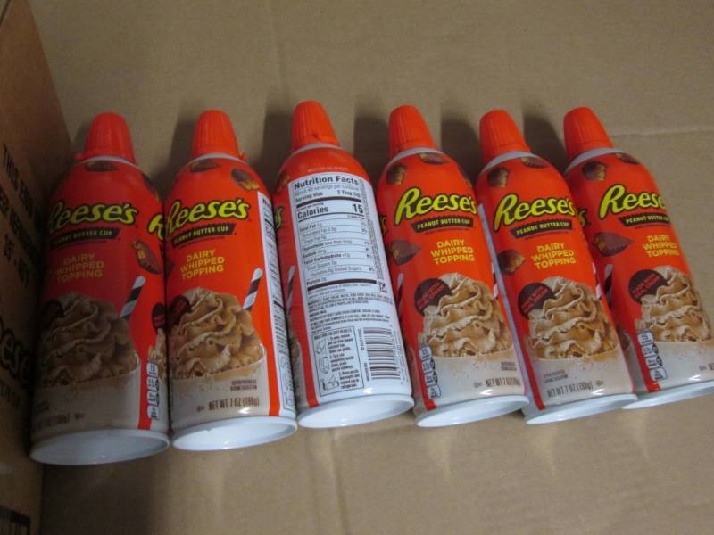 6 Cans of Reeses peanut butter cup...