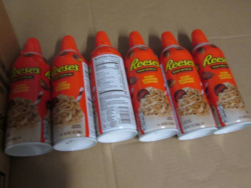 6 Cans of Reeses peanut butter cup...