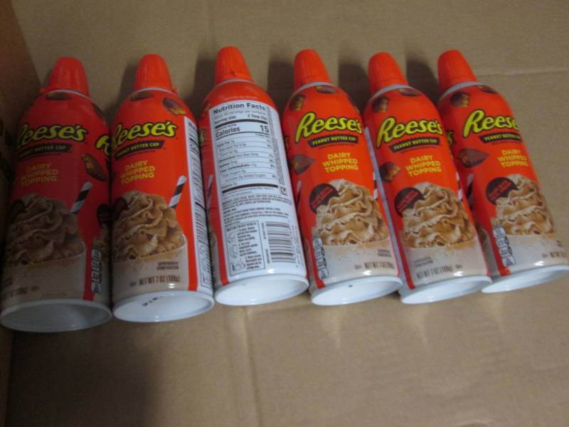 6 Cans of Reeses peanut butter cup...