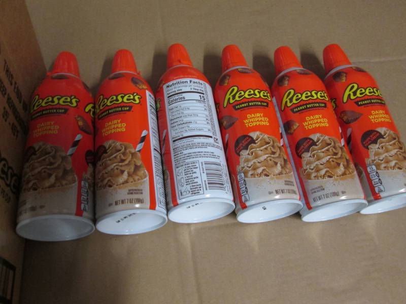 6 Cans of Reeses peanut butter cup...