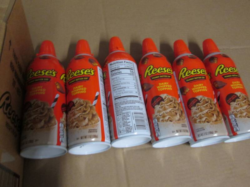 6 Cans of Reeses peanut butter cup...