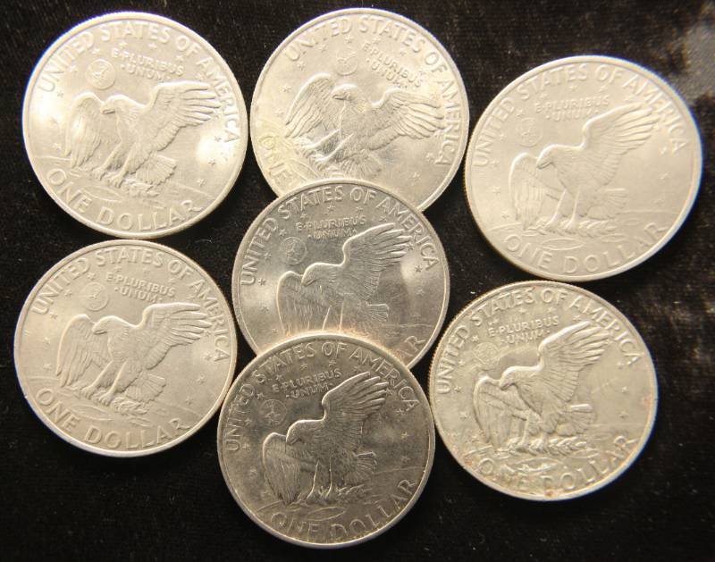 GROUP OF 7 CLAD EISENHOWER DOLLARS