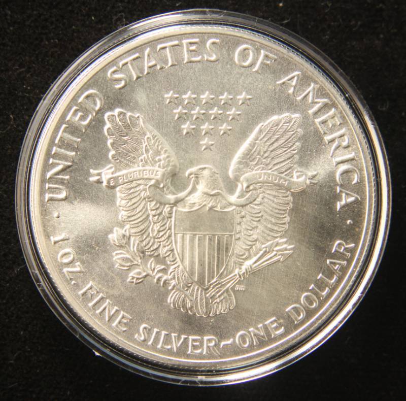 1987 AMERICAN SILVER EAGLE 1 TROY OZ. .999 FINE SILVER IN AIRTITE