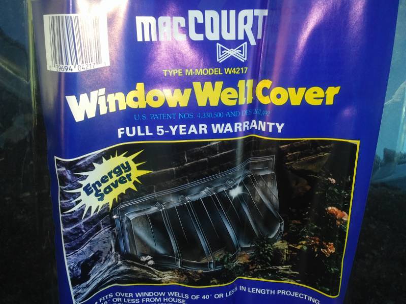 lot 43 image: 2 window well covers - new.