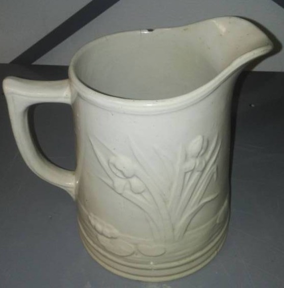 lot 53 image: Red Wing crock pitcher 8 in tall.