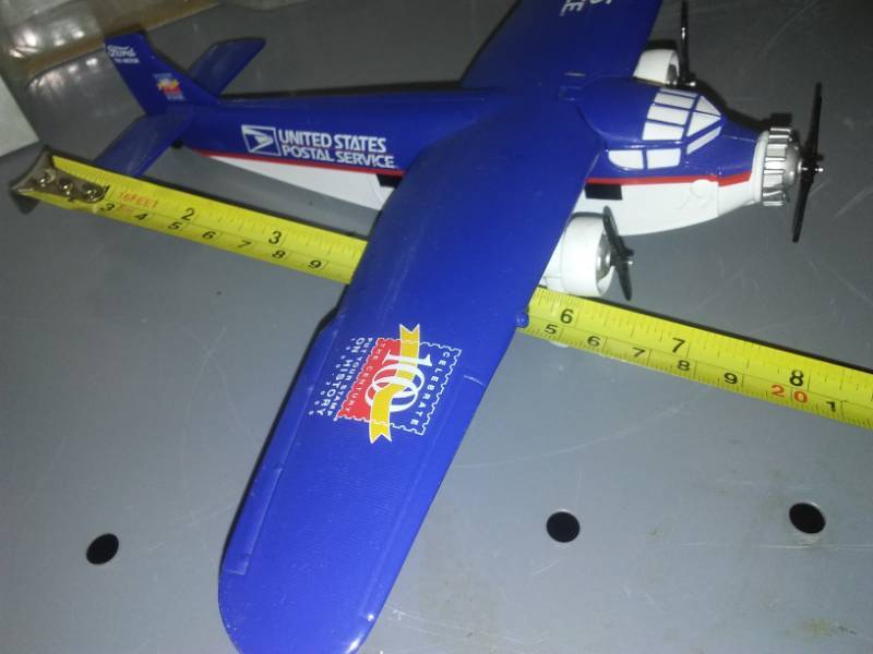 lot 65 image: U.S. Postal Service airplane 100 years.
