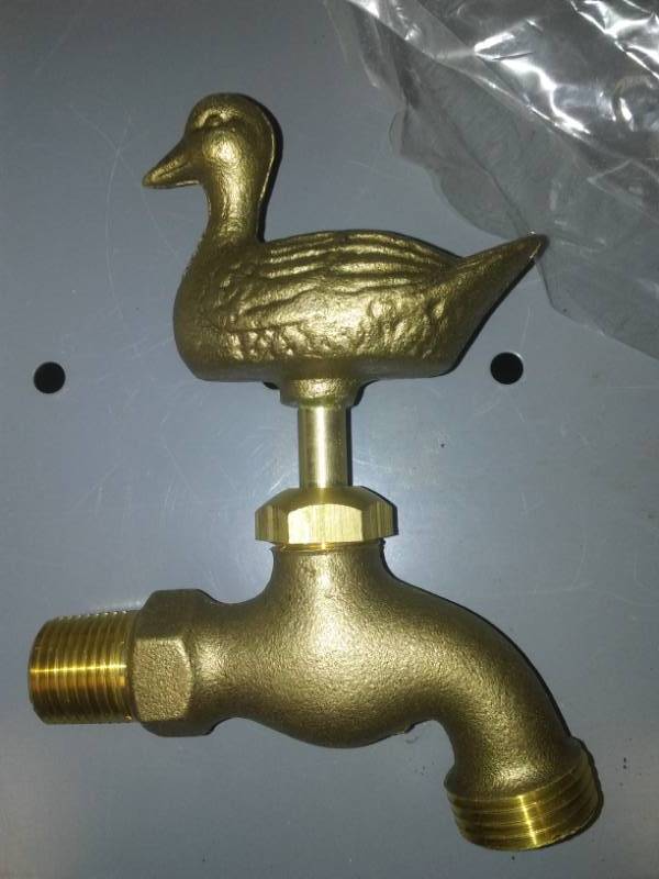 lot 76 image: Vintage new in box duck faucet 12 inch.