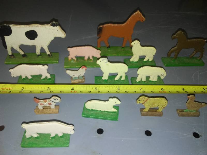 lot 124 image: 14 hand cut farm animals