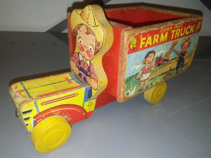 lot 125 image: Fisher Price wood farm truck - good graphics