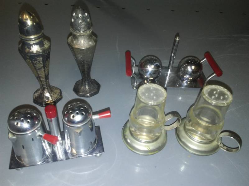 lot 133 image: 4 pair salt and pepper shakers - Mid Century Modern lanterns, coffee pots, balls on a platter coming home decor.