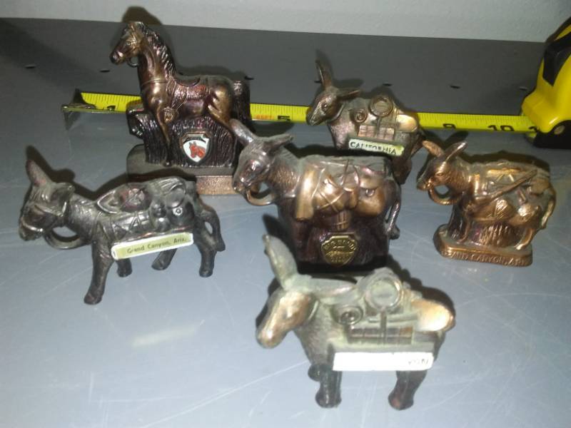 lot 159 image: 6 brass western themed souvenirs.