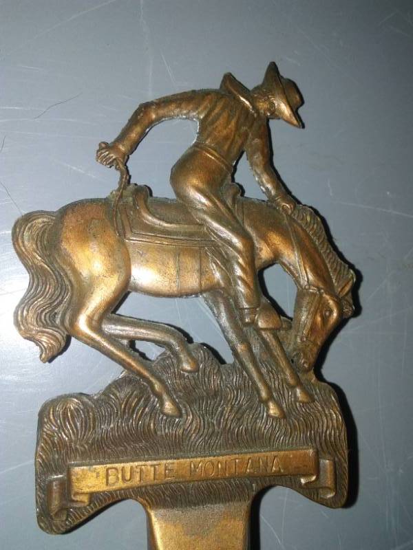 lot 160 image: 8 brass western themed souvenirs.