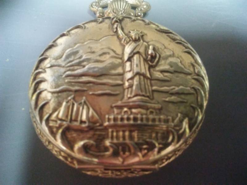lot 175 image: Commemorative America pocket watch numbered LTD Edition 1886 - 1986, quartz.