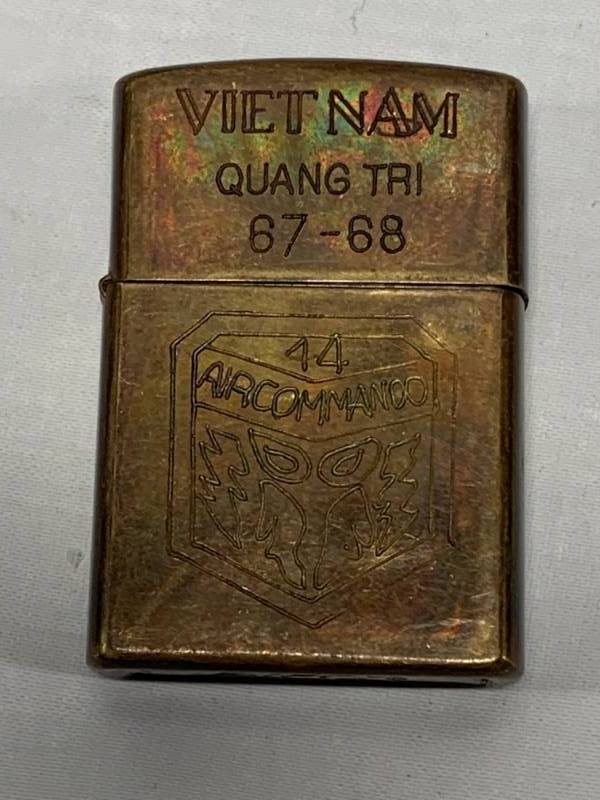 lot 16 image: Vietnam Hand Carved Zippo Lighter