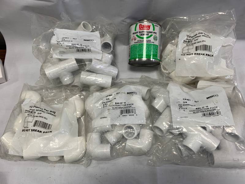 lot 76 image: Bags of PVC 34 Elbows, Tees, & PVC Cement